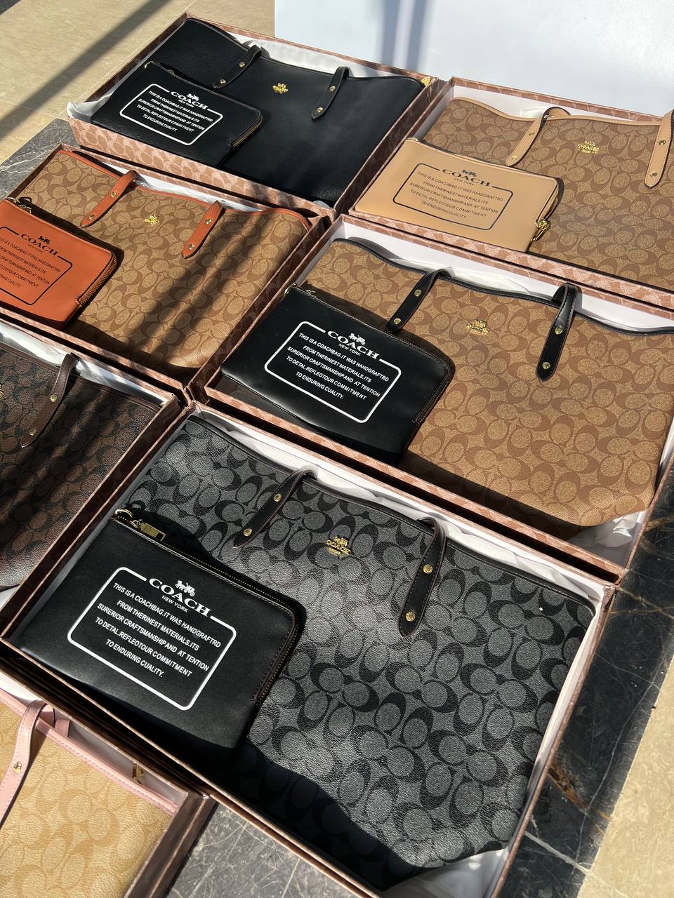 کیف زنانه کوچ نور فول دو تکه زیپ‌دار فول پک سوپر مستر کوالیتی سایز 30×47